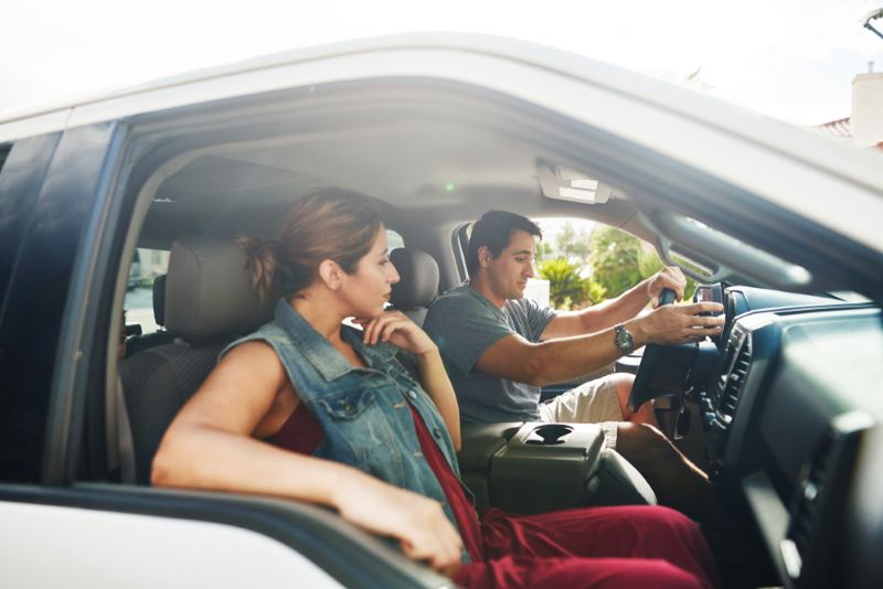 Hispanic family driving together